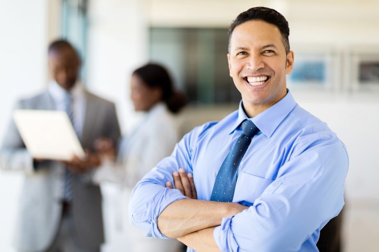 Businessman smiling in office