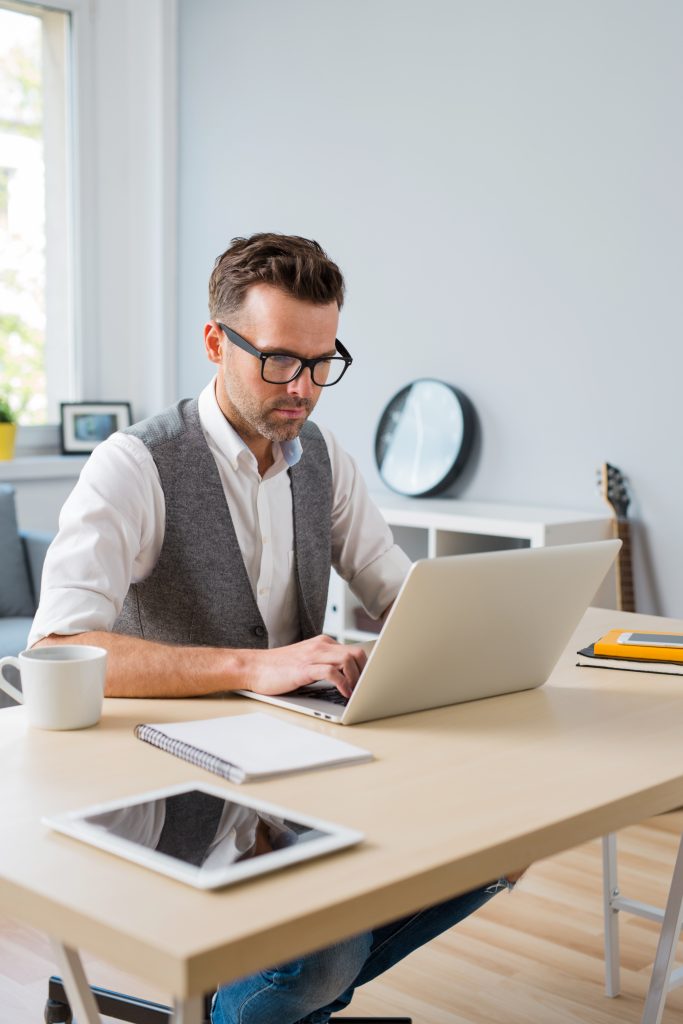 Professional working on laptop