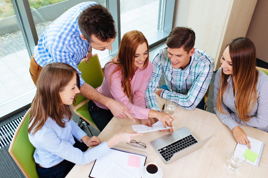 A team working together on a project in the office