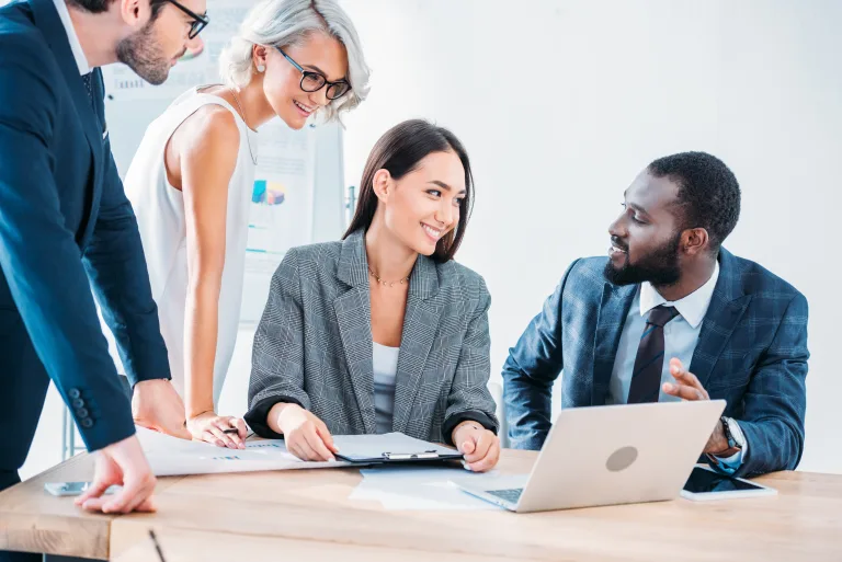 4 team members working together on a project